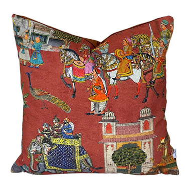 Rust red cushion cover with Indian elephant print on sofa